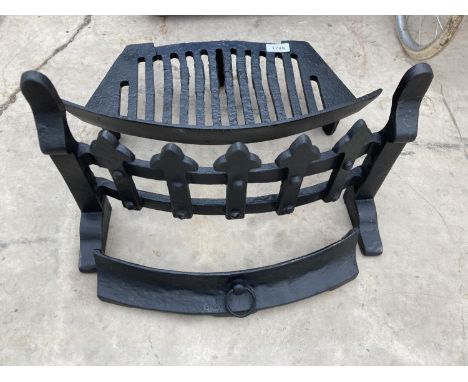 A VINTAGE CAST IRON FIRE GRATE AND FIRE FRONT 