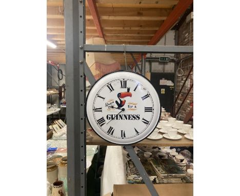 A VINTAGE STYLE 'GUINNESS' WALL CLOCK DIAMETER 41CM - BATTERY OPERATED 