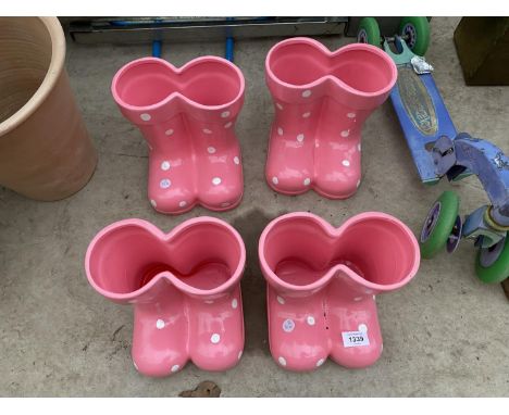 FOUR CERAMIC WELLY PLANTERS 