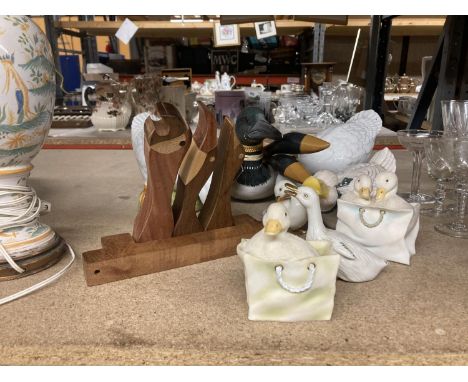 A COLLECTION OF CERAMIC DUCKS AND GEESE, ETC 