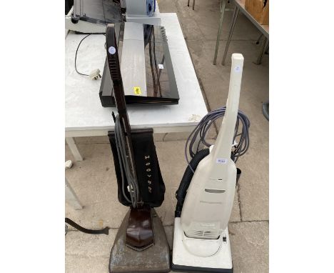 A PANASONIC 1400W VACUUM CLEANER AND A VINTAGE HOOVER 