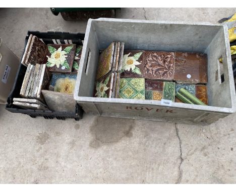 A LARGE ASSORTMENT OF FLORAL CERAMIC TILES 