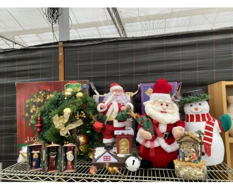 AN EXTENSIVE COLLECTION OF CHRISTMAS DECORATIONS TO INCLUDE AN ILLUMINATED SNOWMAN, SANTA FIGURES, A MUSICAL NATIVITY SCENE A