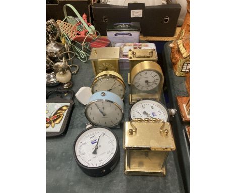 A QUANTITY OF VINTAGE CLOCKS TO INCLUDE CARRIAGE AND ALARM CLOCKS PLUS VINTAGE TINS AND METERS 