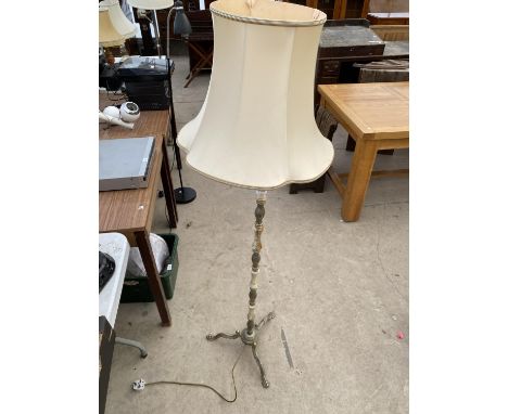 A BRASS AND ONYX STANDARD LAMP WITH SHADE 