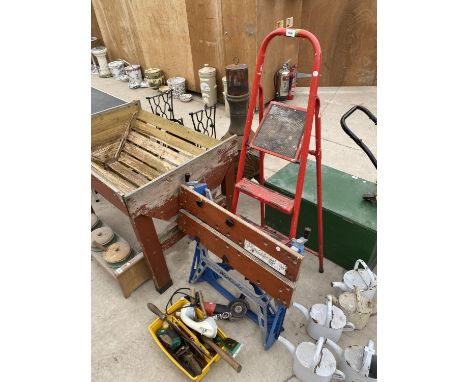 AN ASSORTMENT OF TOOLS TO INCLUDE A FOLDING WORK BENCH, A STEP LADDER AND AN ANGLE GRINDER ETC 
