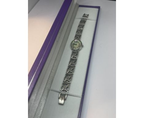 A SILVER ROTARY WRIST WATCH WITH A PEARLISED FACE IN A PRESENTATION BOX 