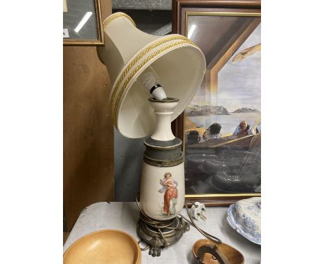 A VINTAGE CERAMIC TABLE LAMP WITH A LADY DECORATION 