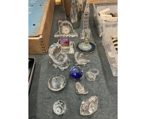 A COLLECTION OF CRYSTAL ORNAMENTS TO INCLUDE A CLOCK, BUTTERFLIES, A PRAM, SWAN, ETC 