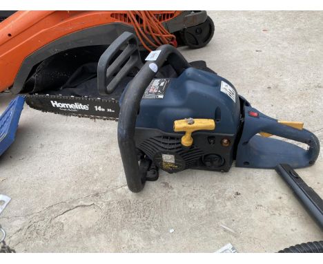 A PERFORMANCE PETROL CHAINSAW WITH HOMELITE 14" BAR 