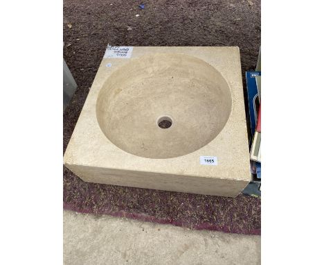 A CREAM SOLID MARBLE WASH BASIN 