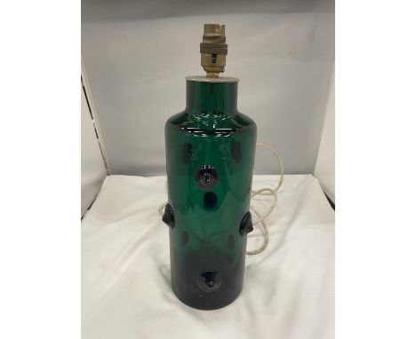 A VINTAGE GREEN GLASS LAMP BASE 