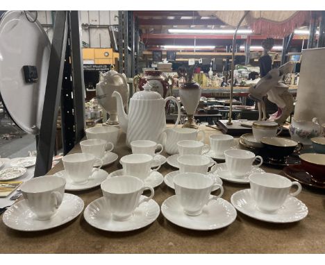 A MINTON 'WHITE FIFE' COFFEE SET TO INCLUDE A COFFEE POT, CREAM JUG, SUGAR BOWL, CUPS AND SAUCERS 