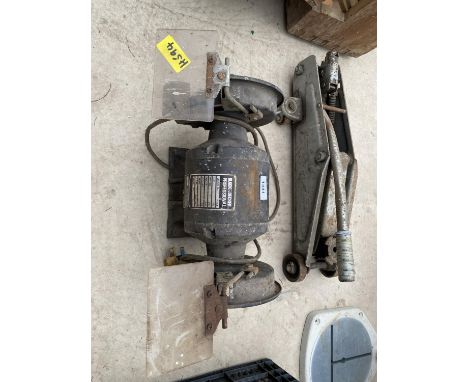 A BLACK AND DECKER BENCH GRINDER AND A TROLLEY JACK 