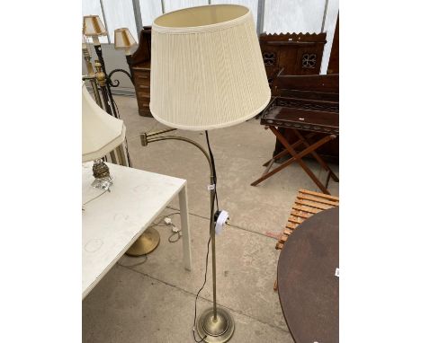 A BRASS STANDARD LAMP 