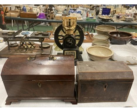 A VINTAGE BURR WALNUT DOME LIDDED BOX WITH BRASS HANDLE AND ESCUTCHEON, INLAY ON THE INSIDE OF THE LID AND THREE INNER COMPAR