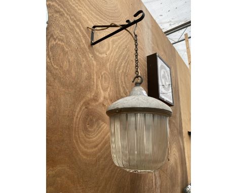 A VINTAGE WALL MOUNTED COURTYARD LIGHT BEARING THE NAME 'COUGHTRIE GLASGOW' 