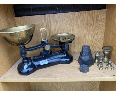 A SET OF LIBRA SCALE CO. KITCHEN BALNACE SCALES WITH CAST IRON AND BRASS BELL WEIGHTS