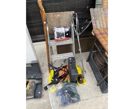 AN ASSORTMENT OF TOOLS TO INCLUDE A COMPRESSOR, A STICK SEAT AND A WALKING STICK ETC 