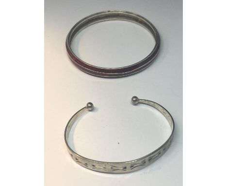 TWO MARKED SILVER BANGLES ONE WITH RED ENAMEL 
