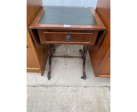 A SMALL REPRODUCTION SOFA TYPE TABLE 