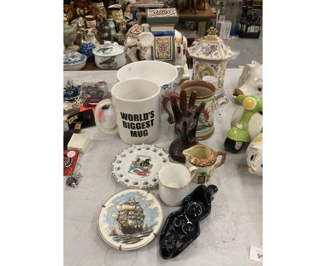 A QUANTITY OF ITEMS TO INCLUDE A 'CLOCK OF ONE HUNDRED FLOWERS' BY DAWEN WANG, AN ELEPHANT PLANT STAND, WORLD'S BIGGEST MUG, 