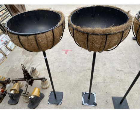 A PAIR OF FREESTANDING GOBLET PLANTERS COMPLETE WITH LINER (H:125CM)(DIAMETER OF PLANTER:16") 