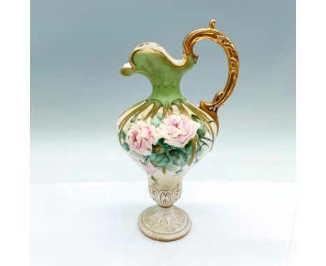 A stunning green and cream-colored pitcher with a gilded handle. Hand painted with pink roses and gilded accents. Amphora RSt