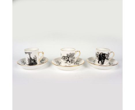 Charming set for three decorated with transfer print depicting different wild animals; elephant, giraffe, and cougar. Saucers