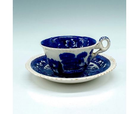 Ridged cup and saucer with deep blue landscape pattern throughout. Set includes teacup 2.25"H x 4"dia. and saucer 1"H x 6"dia