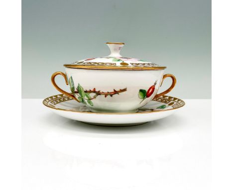 A white and gold-colored floral soup bowl that has two handles and a lid along with a plate that is matching in design. B &am