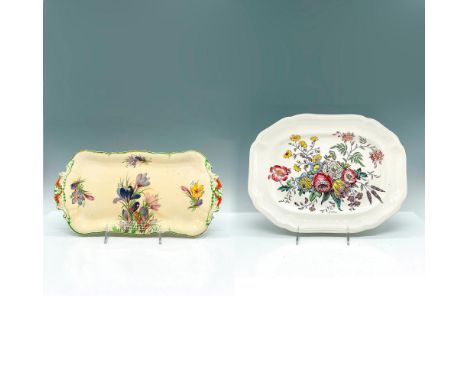 Pair of ceramic trays with floral decal designs. Royal Venton tray displays purple lilies, green trim, and low floral relief 