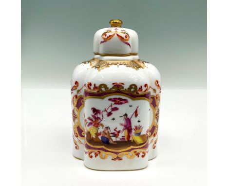 Beautiful lobed lidded tea caddy in the chinoiserie style with gilt accents. It is marked on the bottom with the Sevres inter