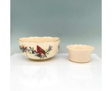 A set of two cream colored bowls, the small one resembling tree bark on the exterior while the large one is smooth with paint