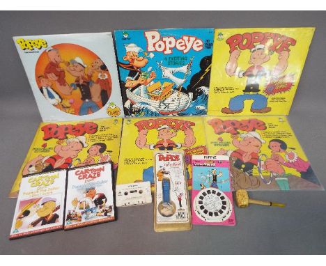 Popeye - A mixed lot of Popeye related items to include six 33 RPM vinyl records containing Popeye stories including one pict