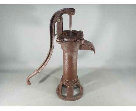 A cast garden pump measuring approximately 50 cms in height. (wpump)