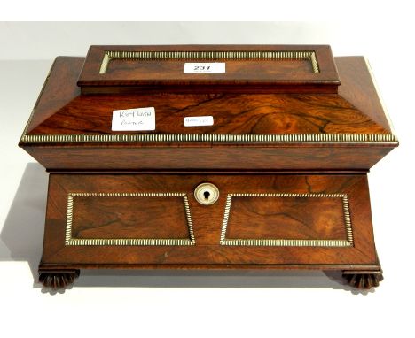 Regency ivory inlaid rosewood tea caddy with porcelain caddies and mixing bowl, the sarcophagus-shaped box with ivory gadroon