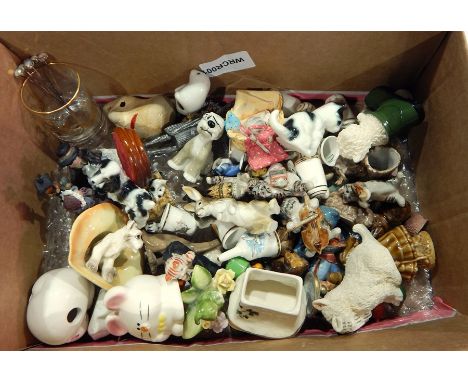 Large quantity Wade and other decorative miniature models, China thimbles, etc. 