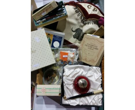 A Parker pen, inkwell and pen set, a powder compact, a gold-coloured powder compact, miscellaneous brooches, pens, a book of 