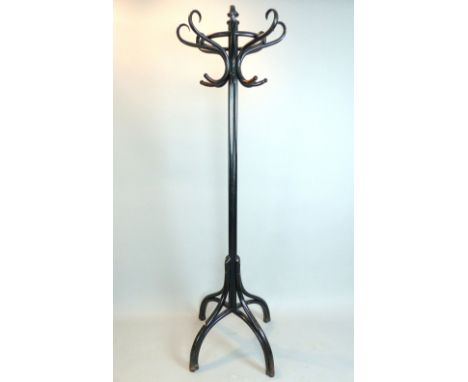 Late 19th century ebonised bentwood hat and coat stand, the cluster central column with acorn finial and an arrangement of ei
