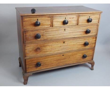 Georgian mahogany chest of 3 over 3 drawers, ebonised handles, cock beading, bracket feet, 112.5cm W. 