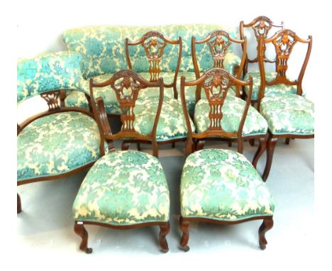 19th C walnut salon suite, double slat sofa roll arms, serpentine front, cabriole legs, ceramic casters, tub chair with folia