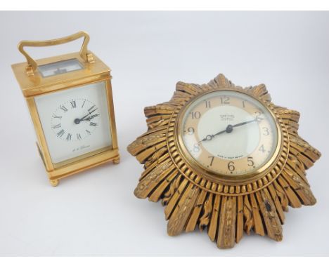 20th century carriage timepiece, the clock case fitted with bevelled panels, the white enamel dial set out with Roman numeral