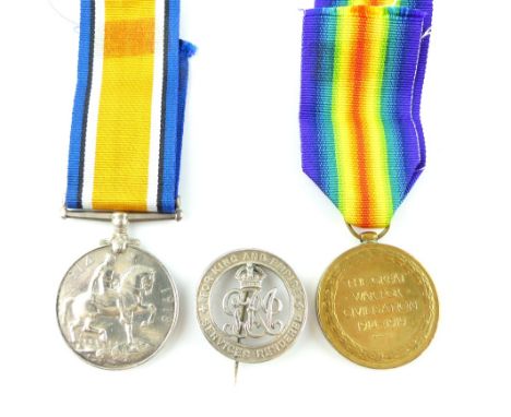 First World War medal pair awarded to PTE C Simpson W. Rid. R, and his silver war discharge lapel badge. (3) 