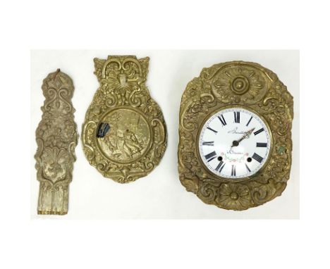 Antique French Brass High Relief Morbier Clock. Inscribed on dial with Roman numerals and decorative hands. Second hand needs