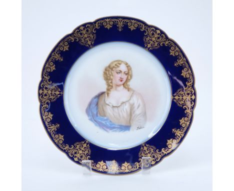 19/20th Century Sevres Portrait Plate. Painted with a bust-length portrait of Mme de Lavalliere. Cobalt and gold decorated bo