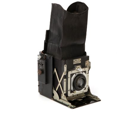 A Newman & Guardia Folding Reflex Hand & Stand Camera, 1921-1930, serial no. FR465, with Ross Xpres f/4.5 136mm lens, black, 