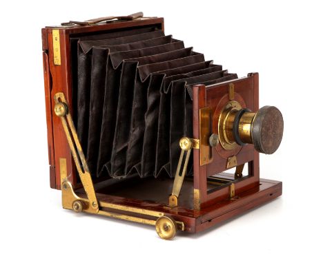 A W. Middlemiss Criterion Patent Half Plate Mahogany Field Camera, 1887, with unmarked f/8 brass lens, body, G-VG, lens, VG, 