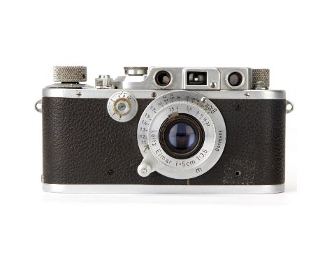 A Leica IIIB Rangefinder Camera, chrome, serial no. 326499, with Leitz Elmar f/3.5 50mm lens, chrome, serial no. 906260, body