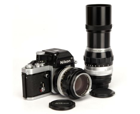 A Nikon F2A Photomic SLR Camera, chrome, serial no. 7117966, with Nikon Nikkor-H f/1.8 85mm lens, black, serial no. 190548, b